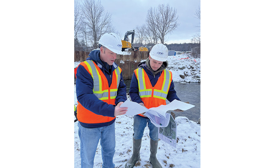 Heath (left)  on Burlington site with project engineer Jeremy Dean
